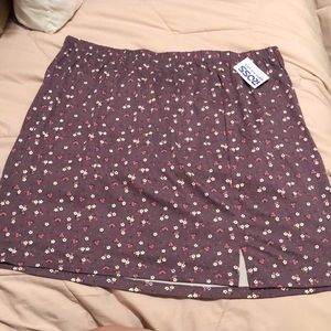 Purple set, matching top with skirt and scrunchie.